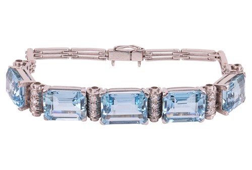 Lot An aquamarine and diamond link bracelet,...