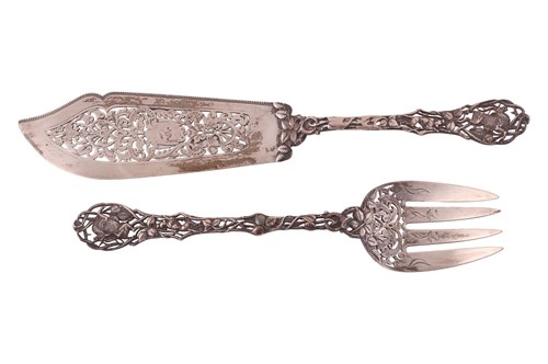 Lot 333 - A pair of Victorian silver fish servers, with...