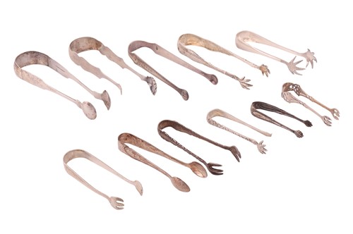 Lot 177 - A pair of George III bright cut sugar nips,...