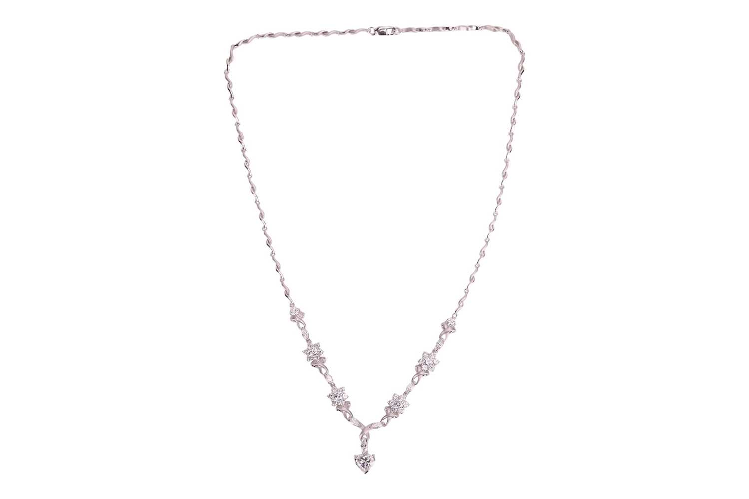 Lot 151 - A diamond-set necklace of floral design, with...