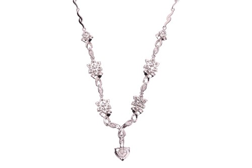 Lot 151 - A diamond-set necklace of floral design, with...