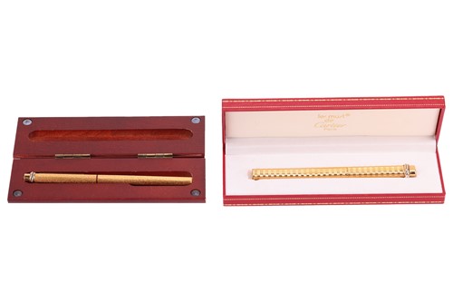 Lot 205 - Two Must De Cartier pens, both of textured...