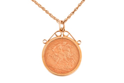 Lot 56 - A Victorian 1889 full sovereign in a 9ct gold...