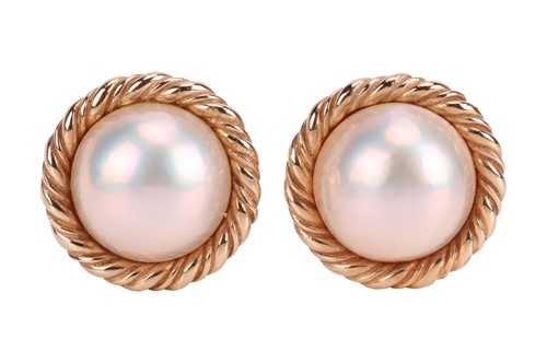 Lot 120 - A pair of mabe pearl clip-on earrings, each...