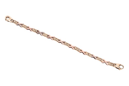 Lot 149 - A fancy link bracelet in tri-coloured 9ct gold,...
