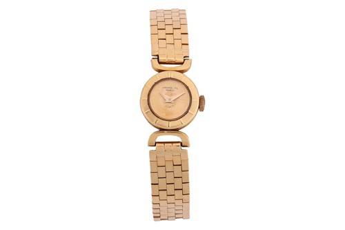 Lot Universal Geneve – An 18ct Gold Dress Watch...