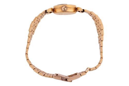 Lot Universal Geneve – An 18ct Gold Dress Watch...