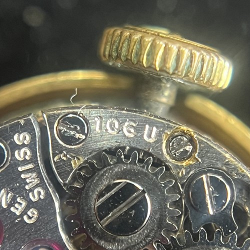 Lot Universal Geneve – An 18ct Gold Dress Watch...