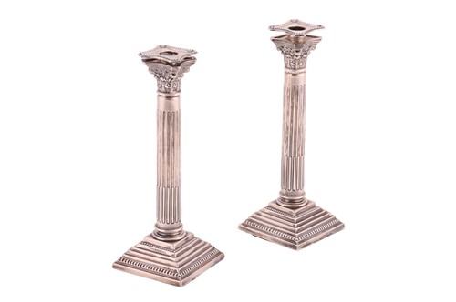 Lot A pair of silver Corinthian column...