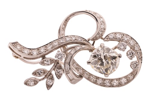 Lot A diamond-set spray brooch, featuring a...