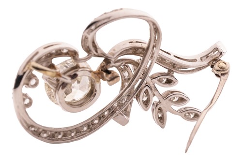 Lot A diamond-set spray brooch, featuring a...