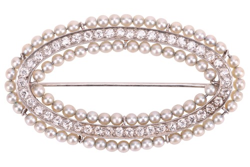 Lot 76 - A Belle Époque oval brooch set with pearl and...