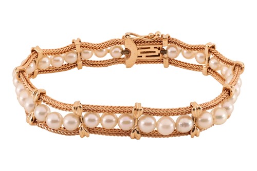 Lot 257 - A pearl-set bracelet, composed of a row of...