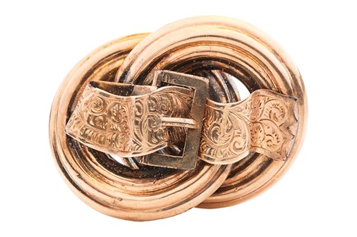 Lot A Victorian buckle brooch, featuring two...