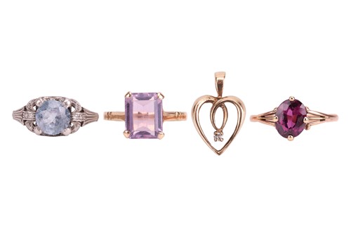 Lot 36 - Three gem-set rings and a heart pendant; to...