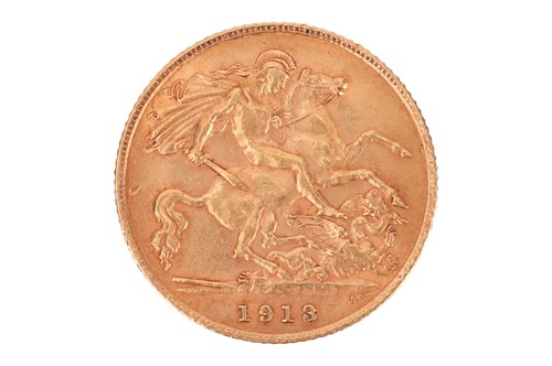 Lot 211 - A George V 1913 half sovereign, bare head to...