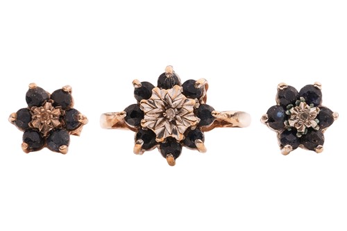 Lot 65 - A sapphire and diamond cluster ring and a pair...