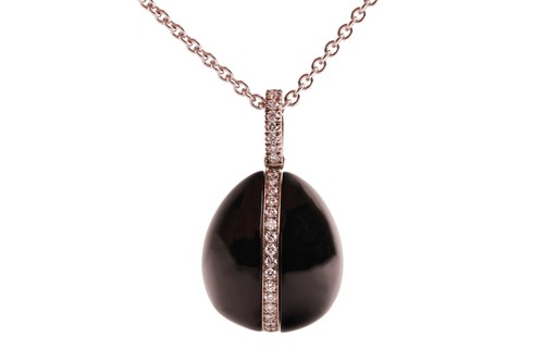 Lot Fabergé - a Whitby jet and diamond egg pendant...