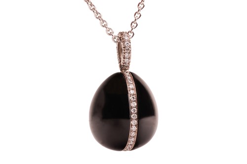 Lot Fabergé - a Whitby jet and diamond egg pendant...