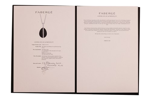 Lot Fabergé - a Whitby jet and diamond egg pendant...