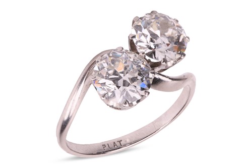 Lot 85 - An early 20th Century toi et moi ring, set...