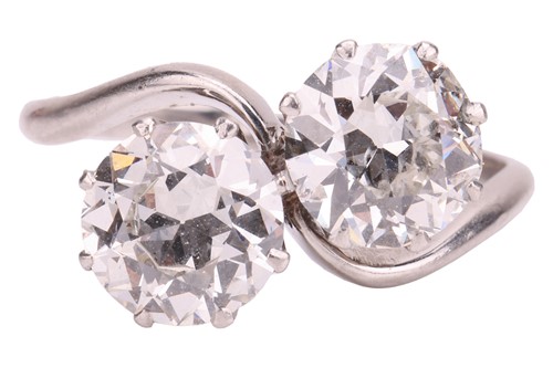 Lot 85 - An early 20th Century toi et moi ring, set...