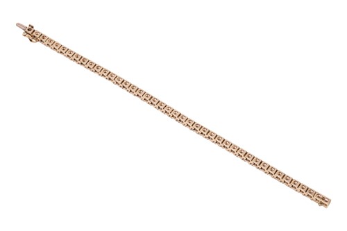 Lot A diamond tennis bracelet, featuring forty-two...