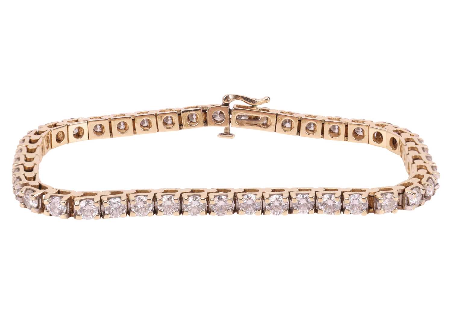 Lot A diamond tennis bracelet, featuring forty-two...