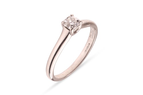 Lot 237 - Tiffany & Co - A diamond solitaire ring,...