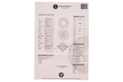 Lot A pair of diamond stud earrings, with a total...