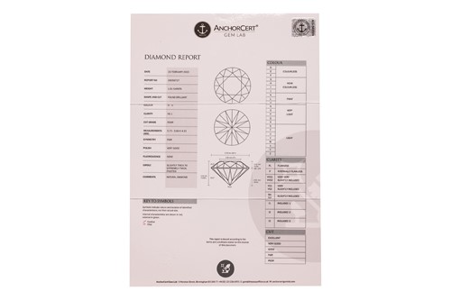 Lot A pair of diamond stud earrings, with a total...