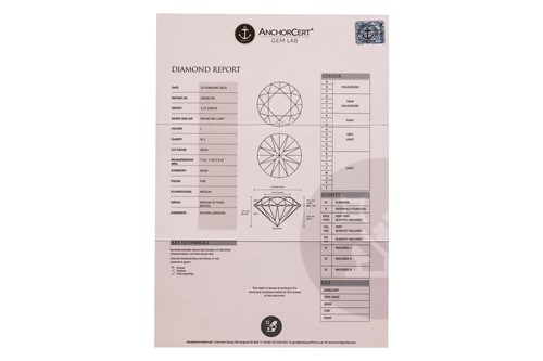 Lot A pair of diamond stud earrings, with a total...