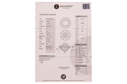 Lot A pair of diamond stud earrings, with a total...