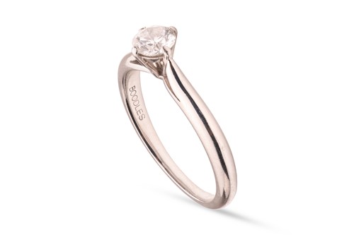 Lot 231 - Boodles - A diamond solitaire ring in platinum,...