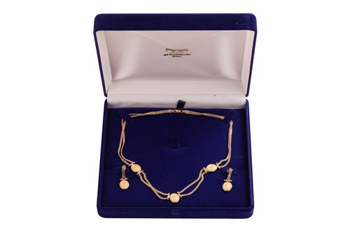 Lot A necklace and earring suite, the double row...