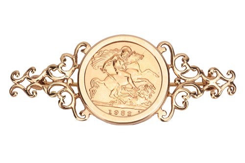Lot 64 - A bar brooch set with a 1982 half sovereign,...