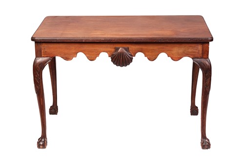 Lot A George III mahogany table, with shell motif...