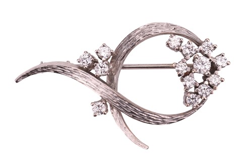 Lot 185 - A diamond-set brooch, featuring a stylised...