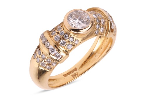 Lot 209 - A diamond-set dress ring, featuring a central...