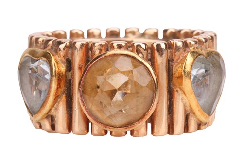 Lot A citrine and aquamarine dress ring, the wide...