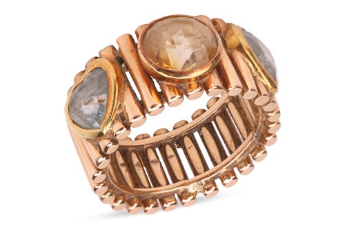 Lot A citrine and aquamarine dress ring, the wide...
