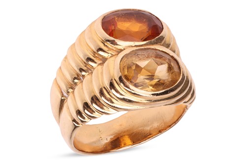 Lot A citrine-set cocktail ring, comprising two...