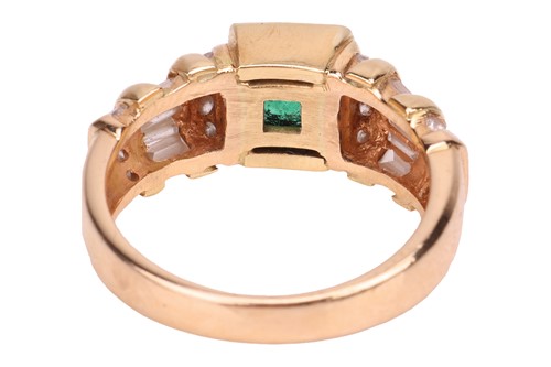 Lot An emerald and diamond dress ring in 18ct gold,...