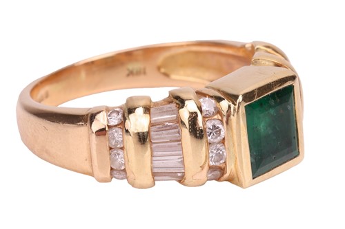 Lot An emerald and diamond dress ring in 18ct gold,...