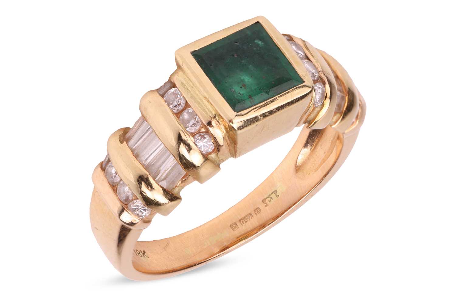 Lot An emerald and diamond dress ring in 18ct gold,...