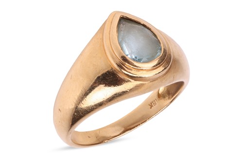 Lot A topaz dress ring, collet-set with a pear-cut...