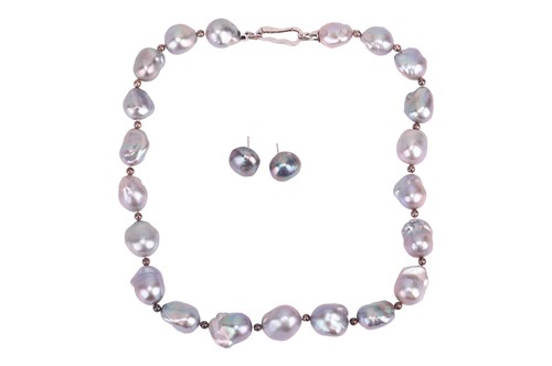 Lot 186 - A baroque pearl single-strand necklace and...