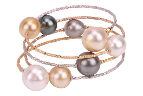 Lot 187 - A cultured pearl and wire bracelet, of...
