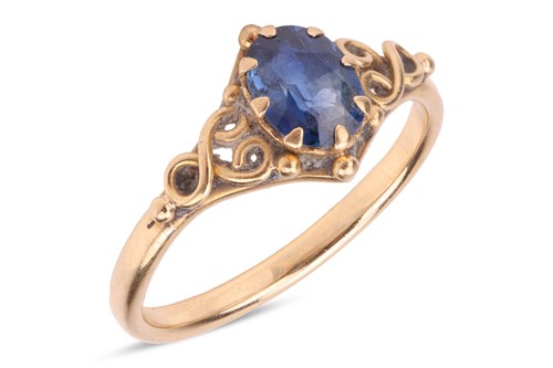 Lot 277 - A sapphire solitaire ring, featuring a central...
