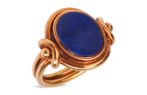 Lot 108 - A lapis lazuli ring, the oval polished lapis...